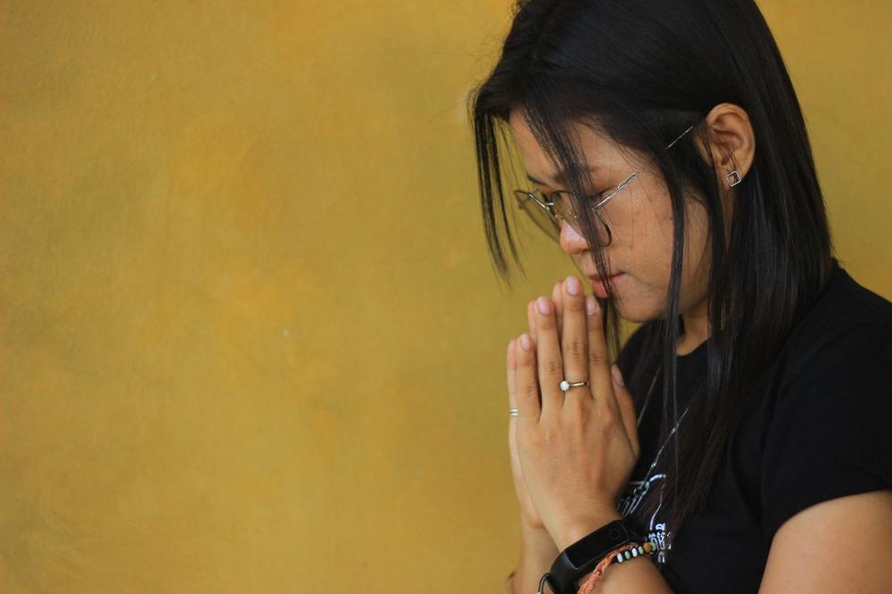 Praying couple